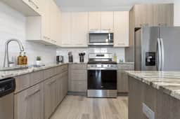 Stylish 2BR Haven | Pool, Free Parking, Gym - Image 4
