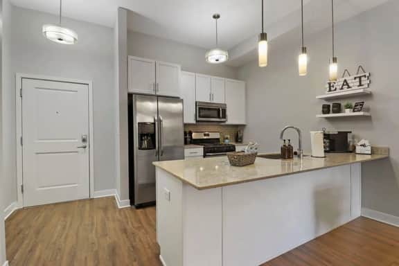 Luxe 1BR DT Elmhurst | Pool, Gym, Garage, King Bed - Image 4